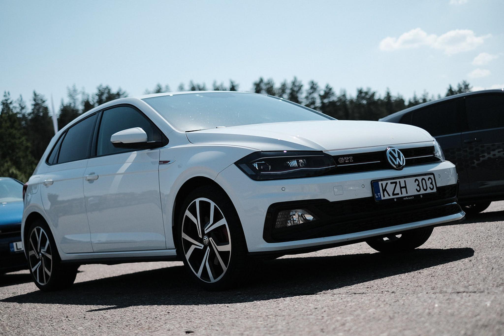 White Volkswagen Polo three-quarter view