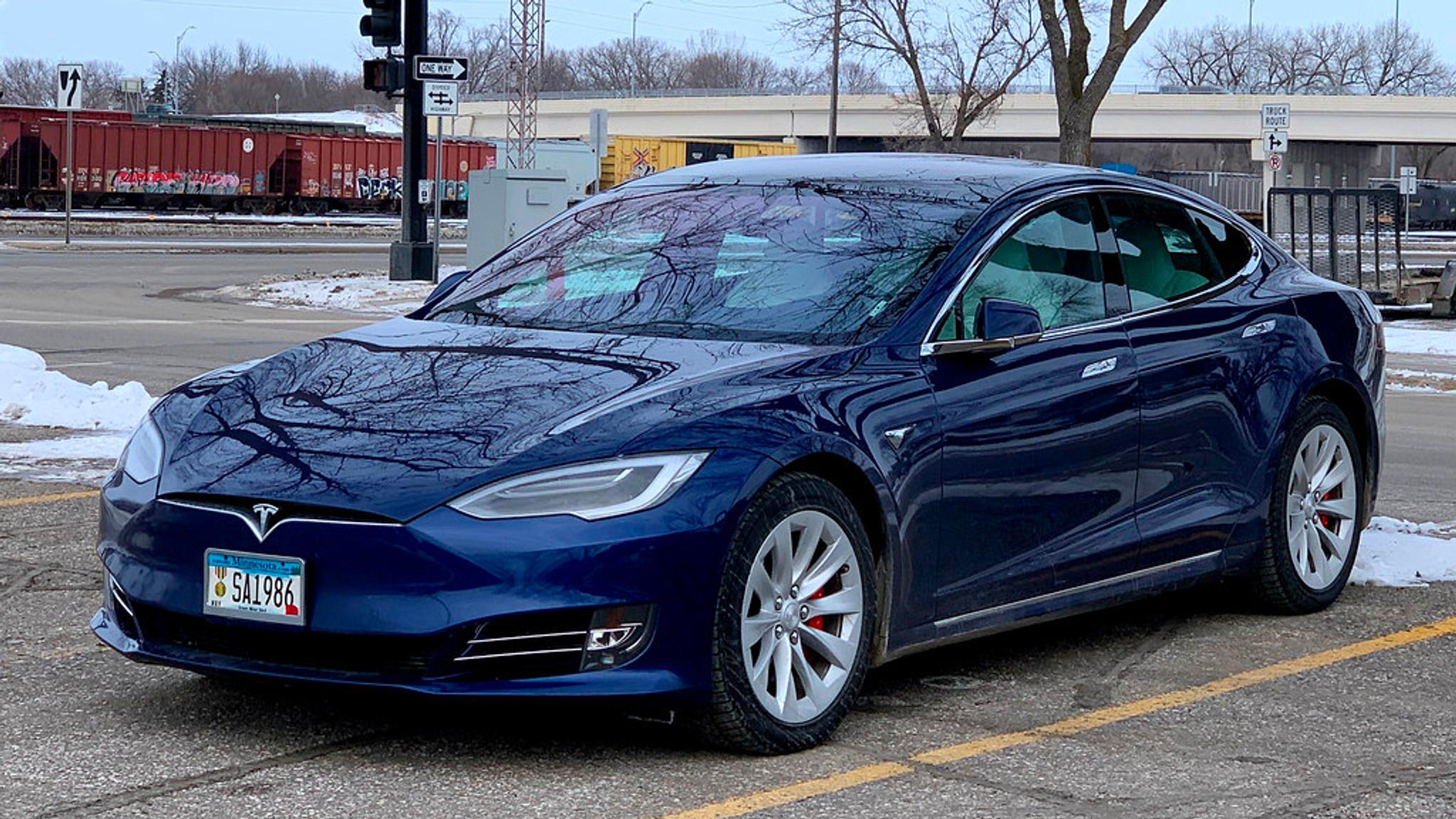 Blue Tesla Model S in the parking lot