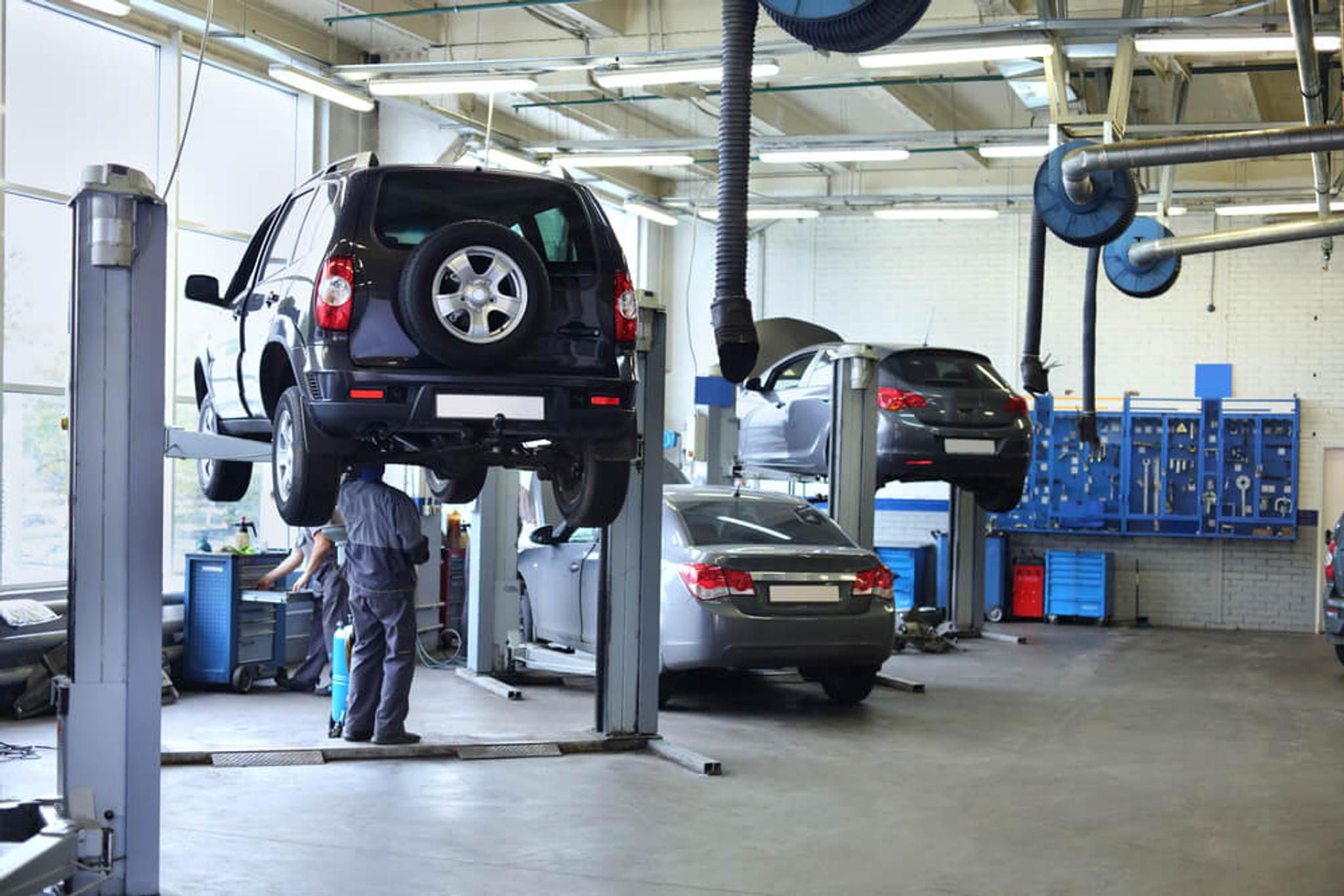 car inspection, car in a garage, vehicle technical inspection