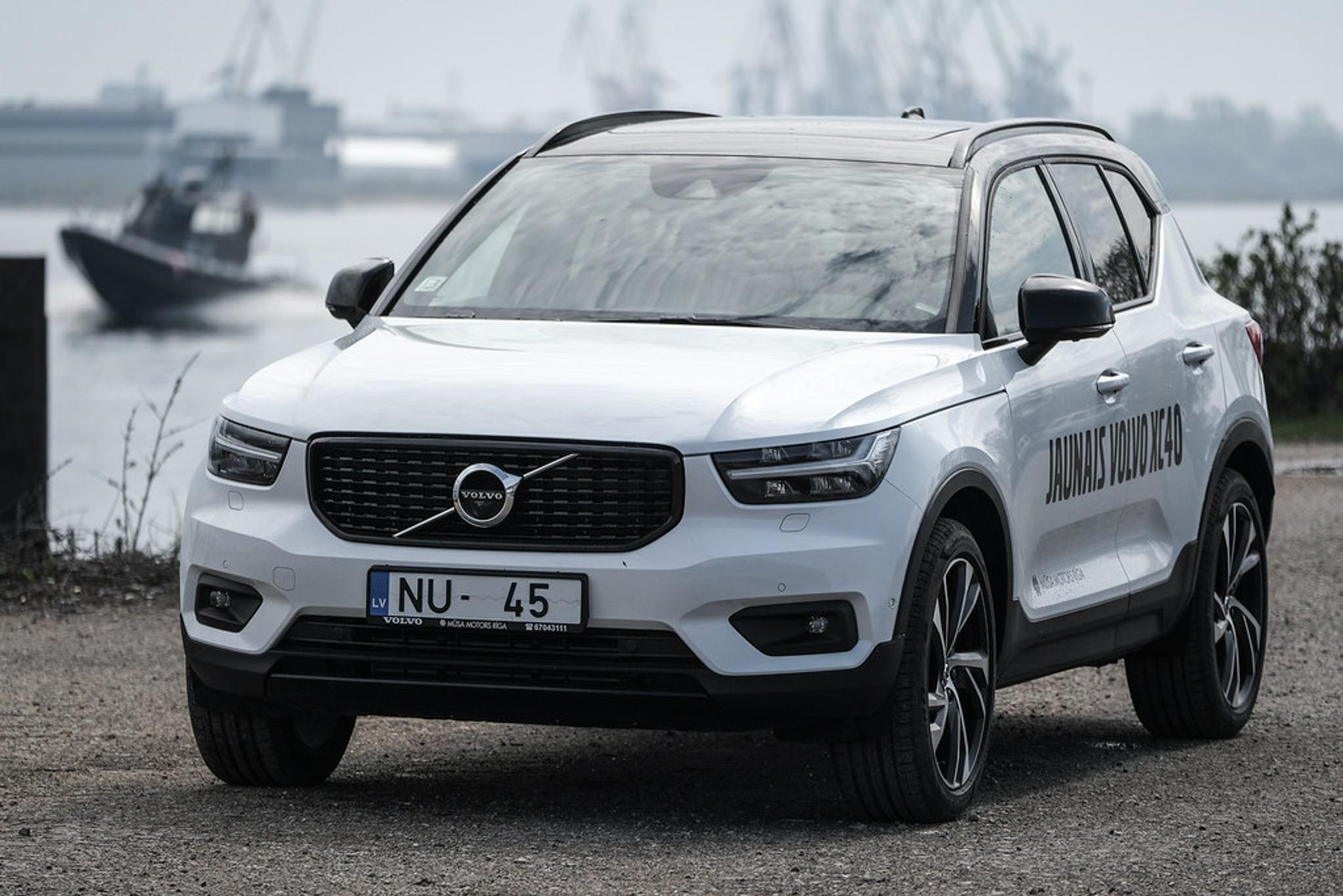 White Volvo XC40 near the ocean