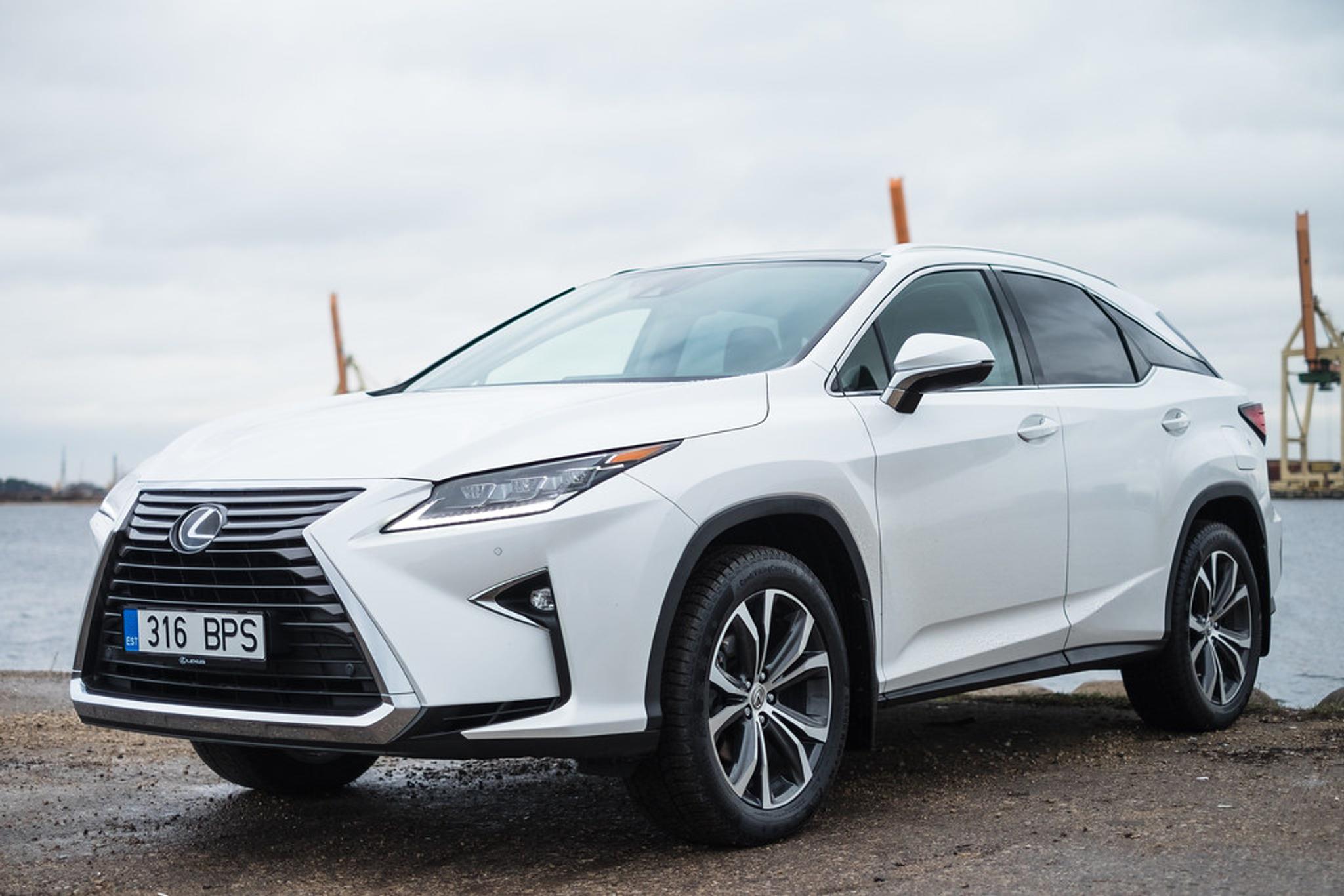 White Lexus RX on a shore