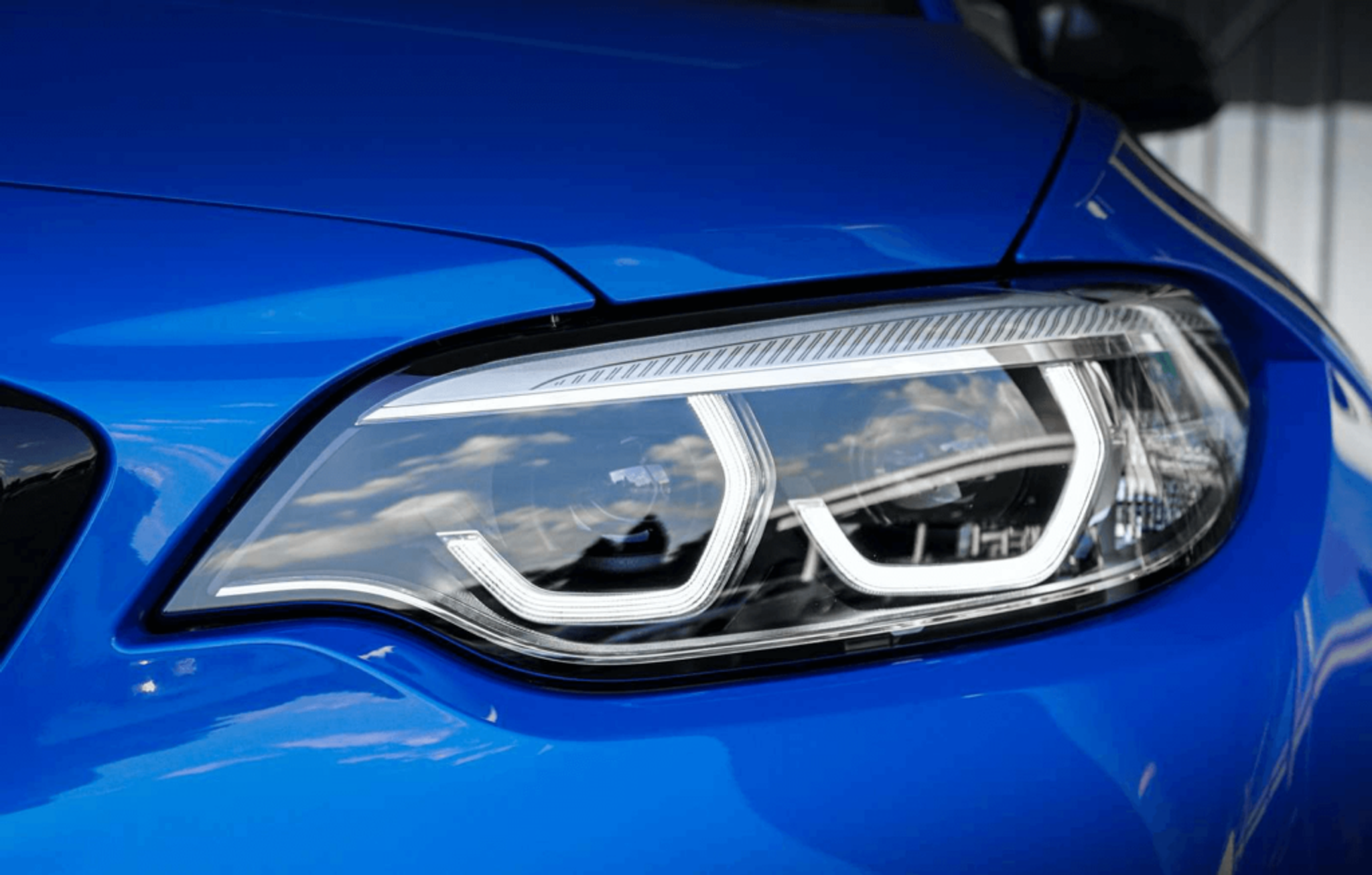 BMW 2 series blue car headlight