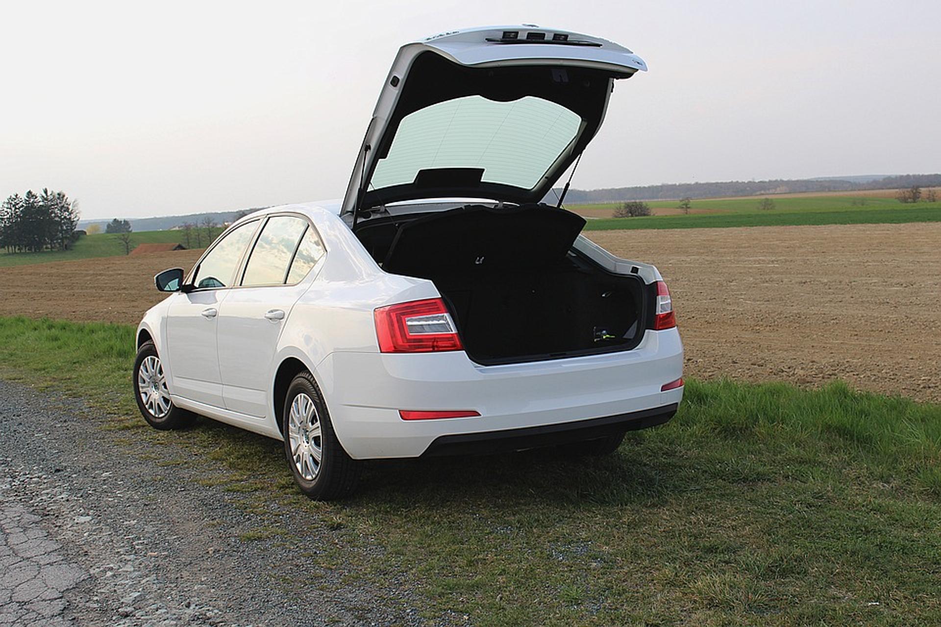 White Skoda Octavia with its bootlid open