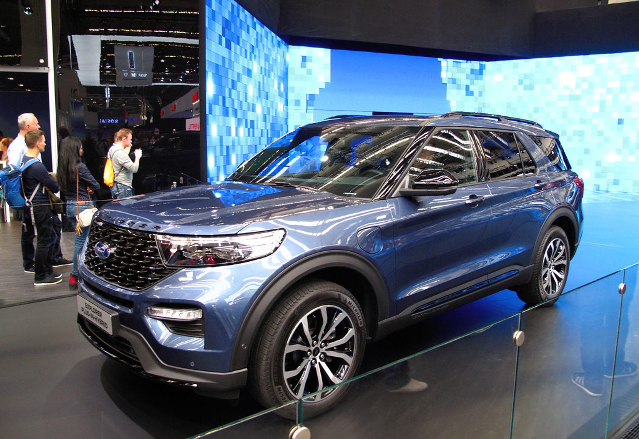 Blue Ford Explorer in a showroom