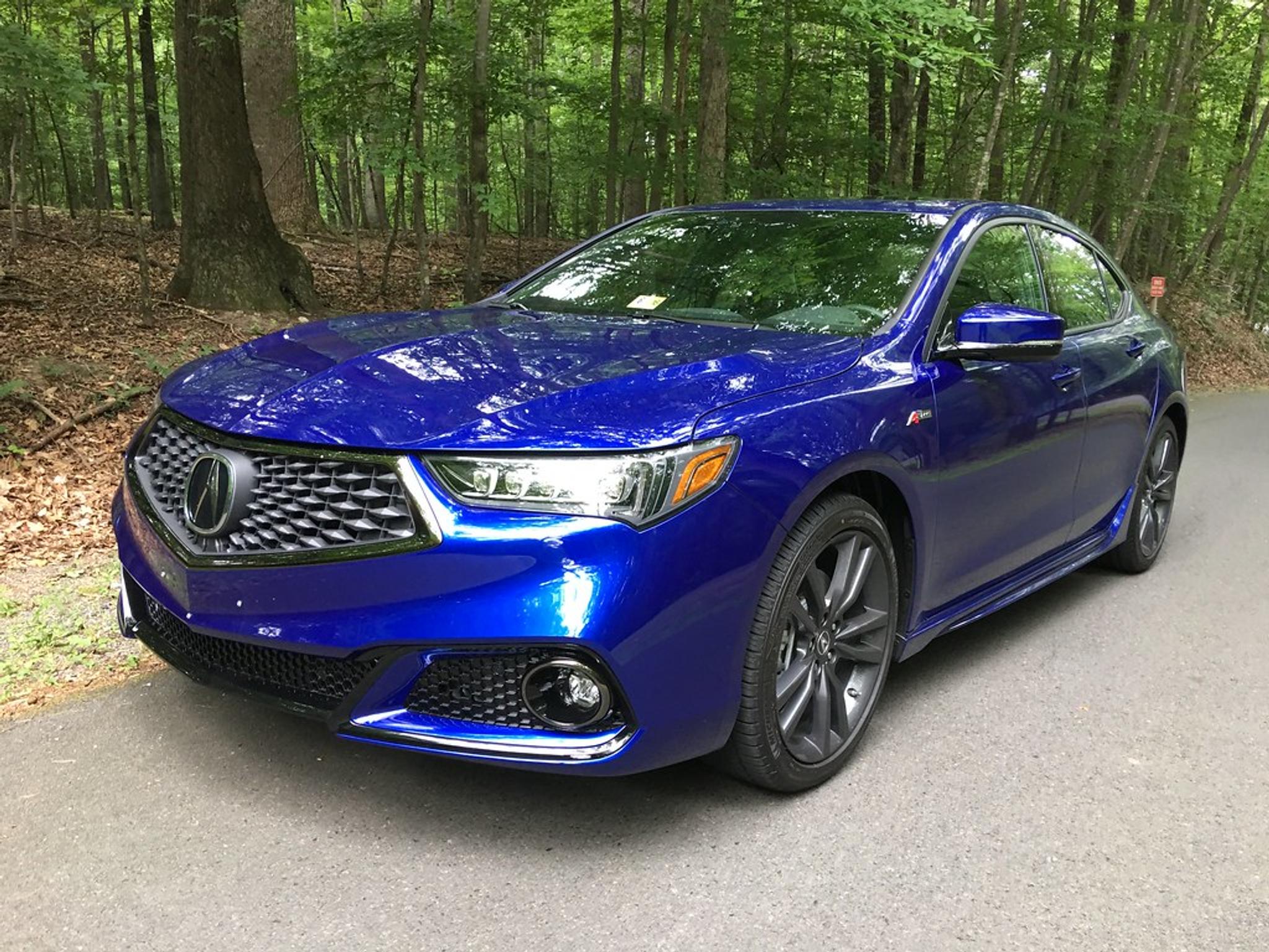 Metallic blue Acura TLX front