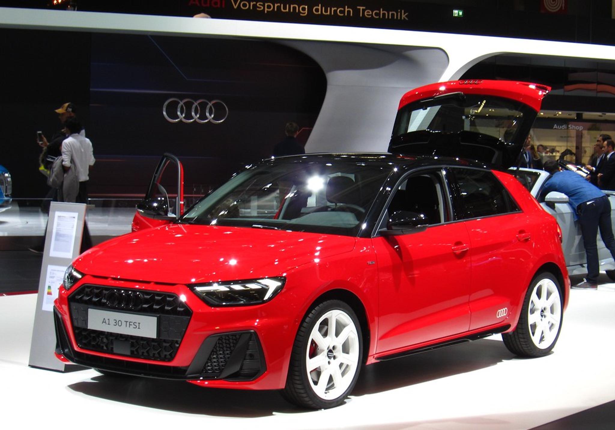 Red Audi A1 in a showroom