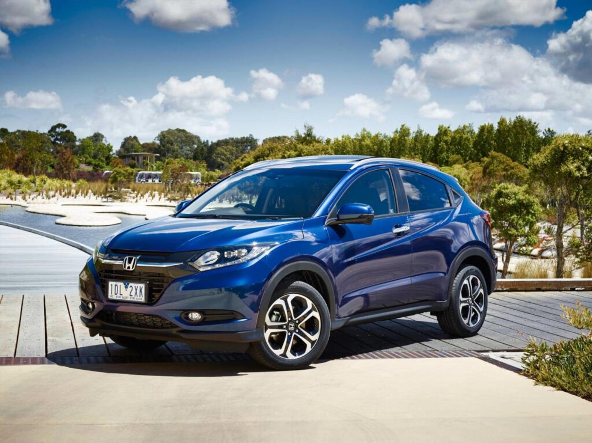 Blue Honda HR-V in direct sunlight