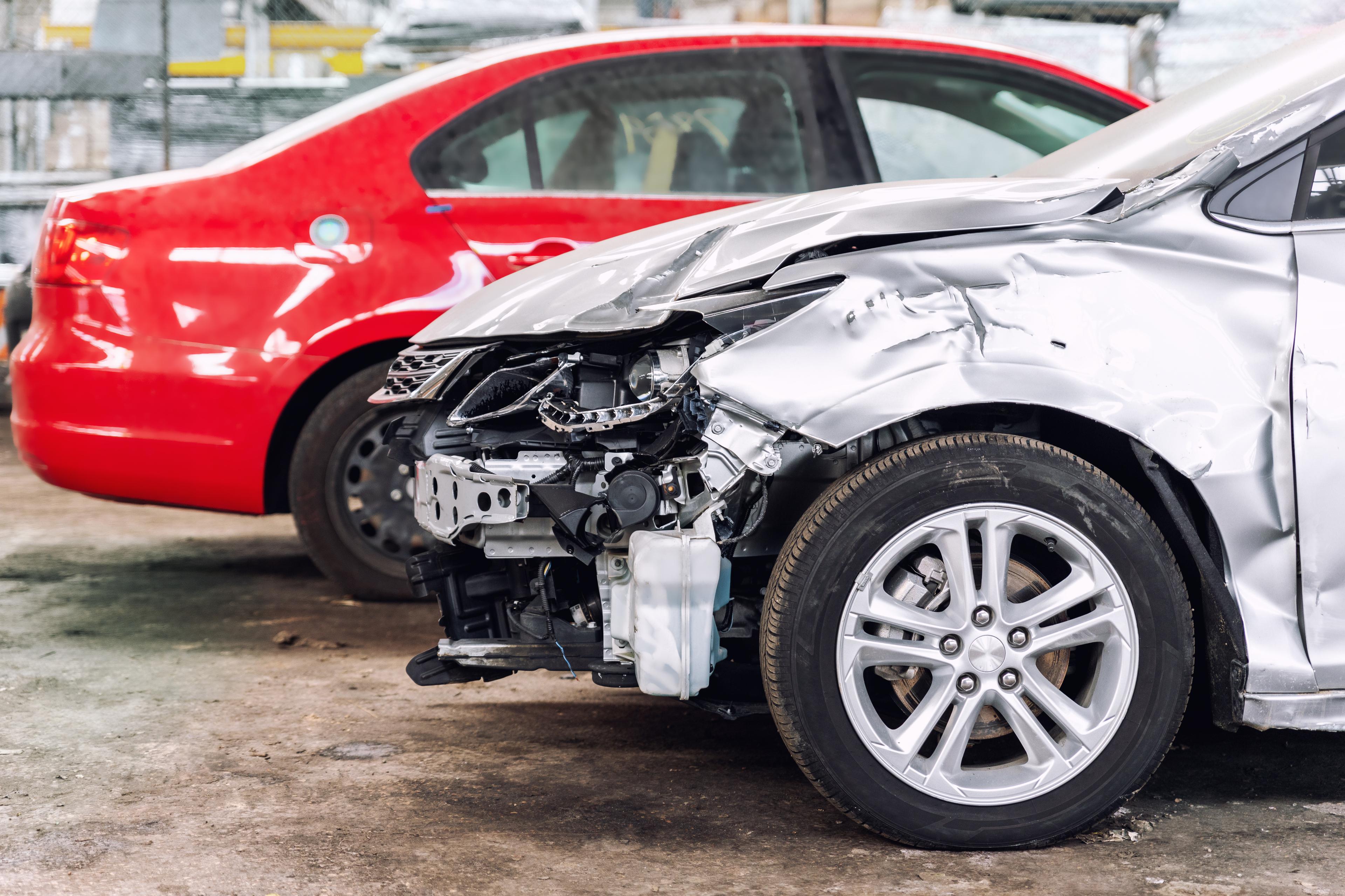 Grey car with a damaged front