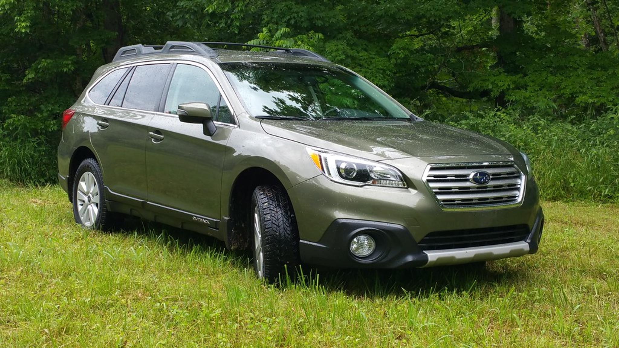 subaru outback, green car in forest, rough terrain drive, 4wd, awd