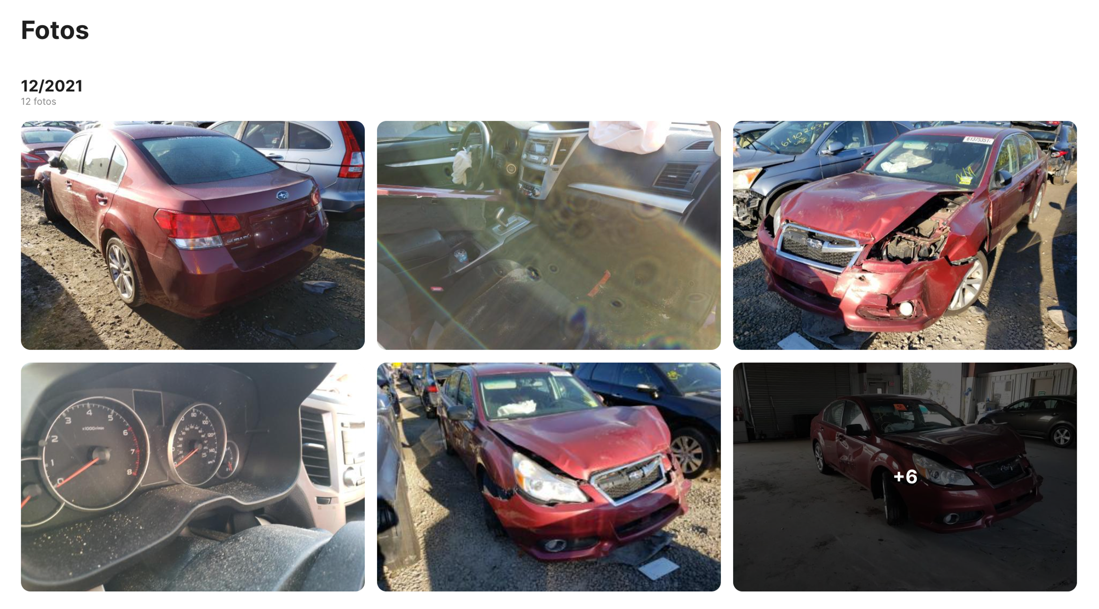 Fotos antigas de um carro danificado apresentadas num relatório da carVertical