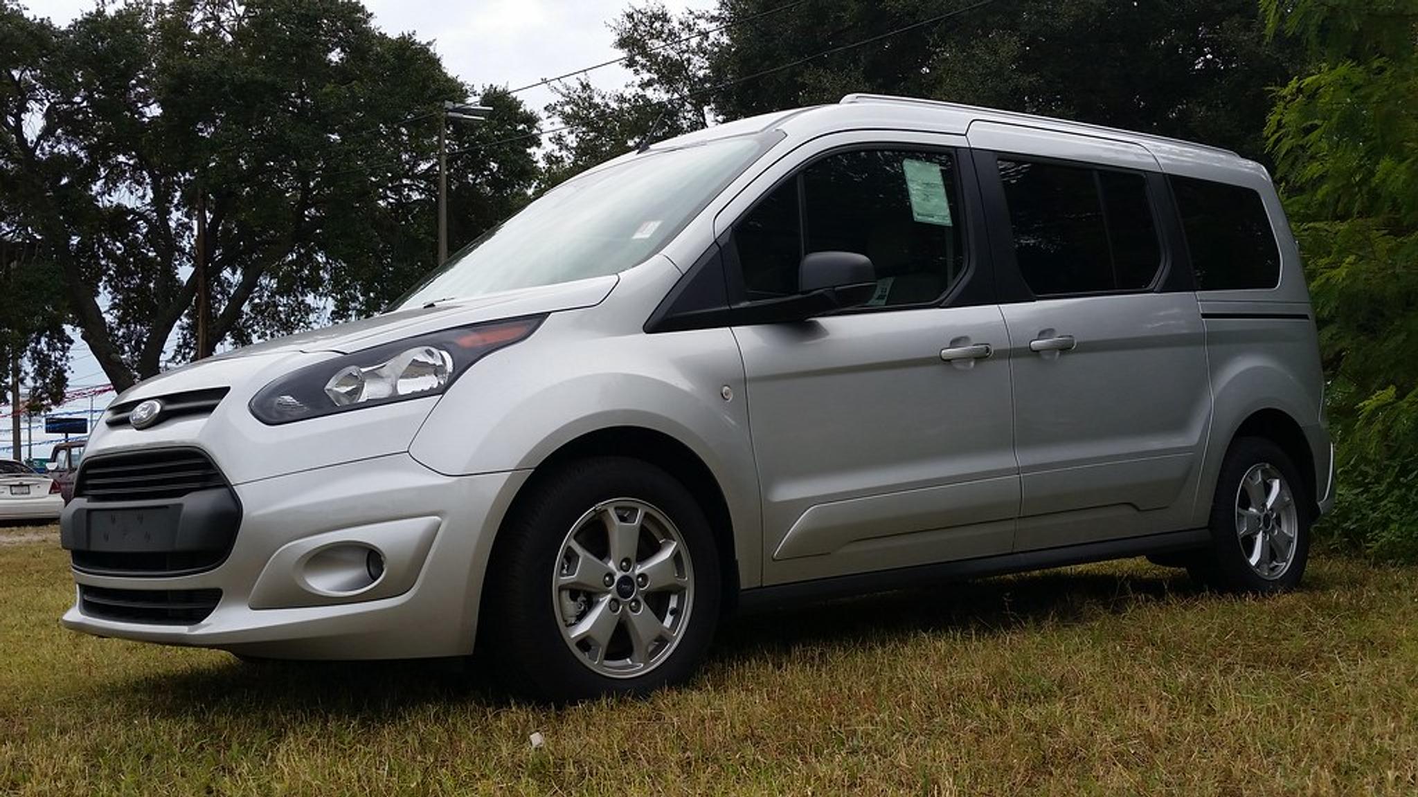 Silver Ford Transit Connect on grass