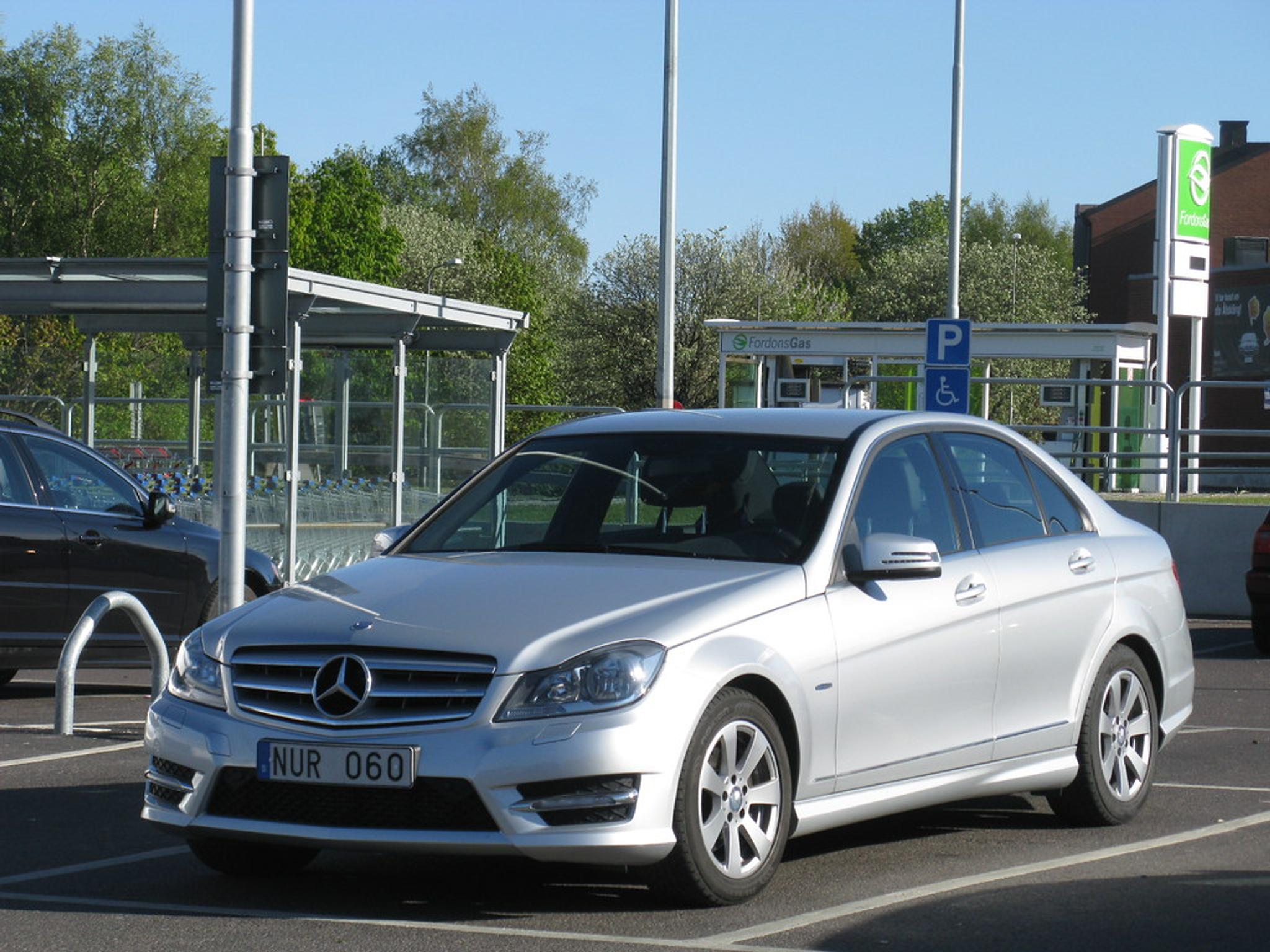 Silver Mercedes C Class W204 in the parking lot