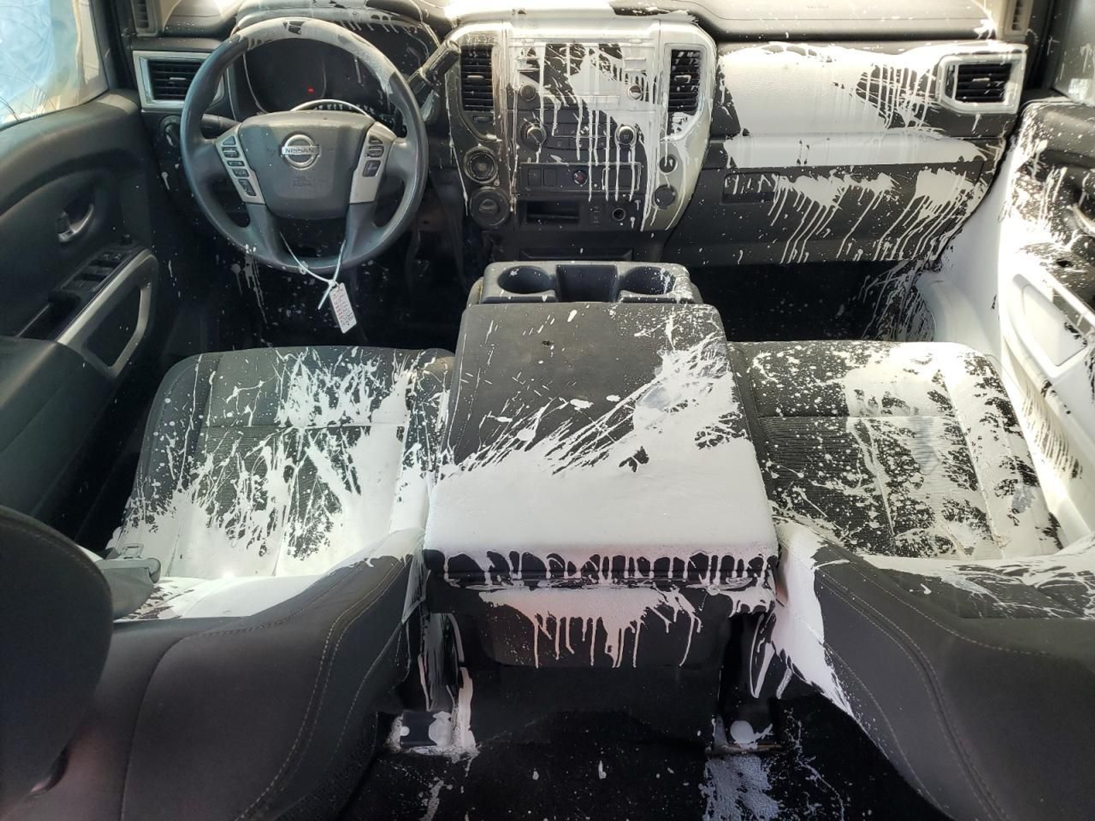 Nissan Tiida interior covered in white paint