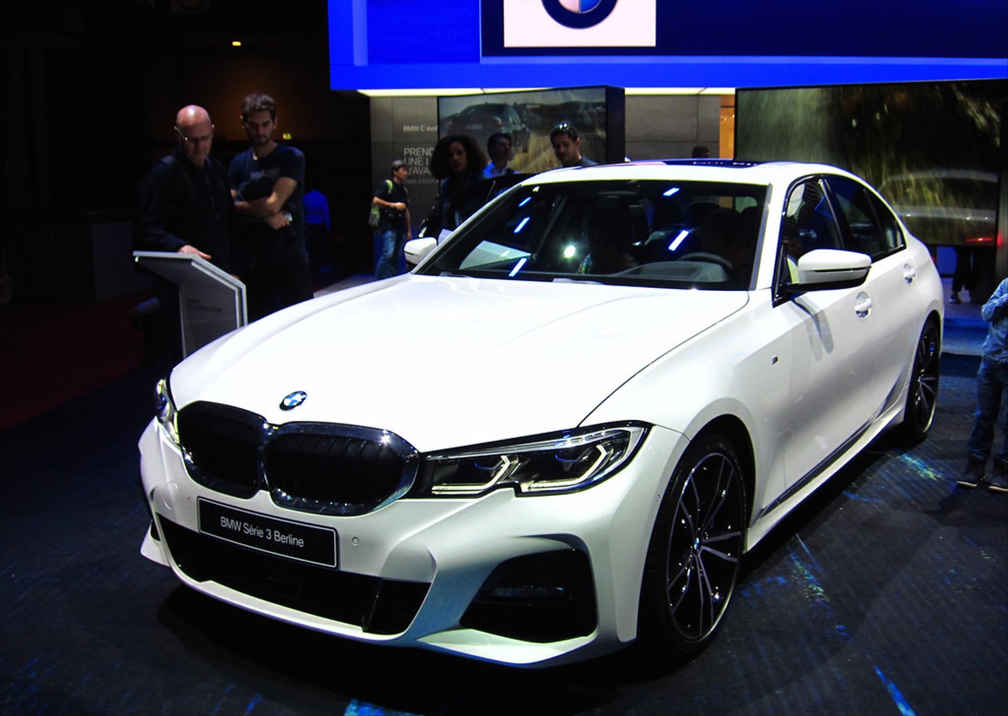 White BMW 3 Series in a showroom