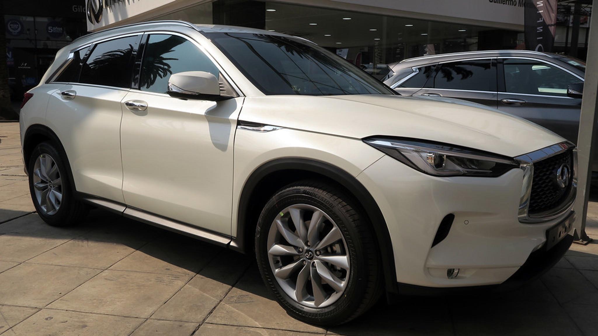 White Infiniti QX50 with tinted windows