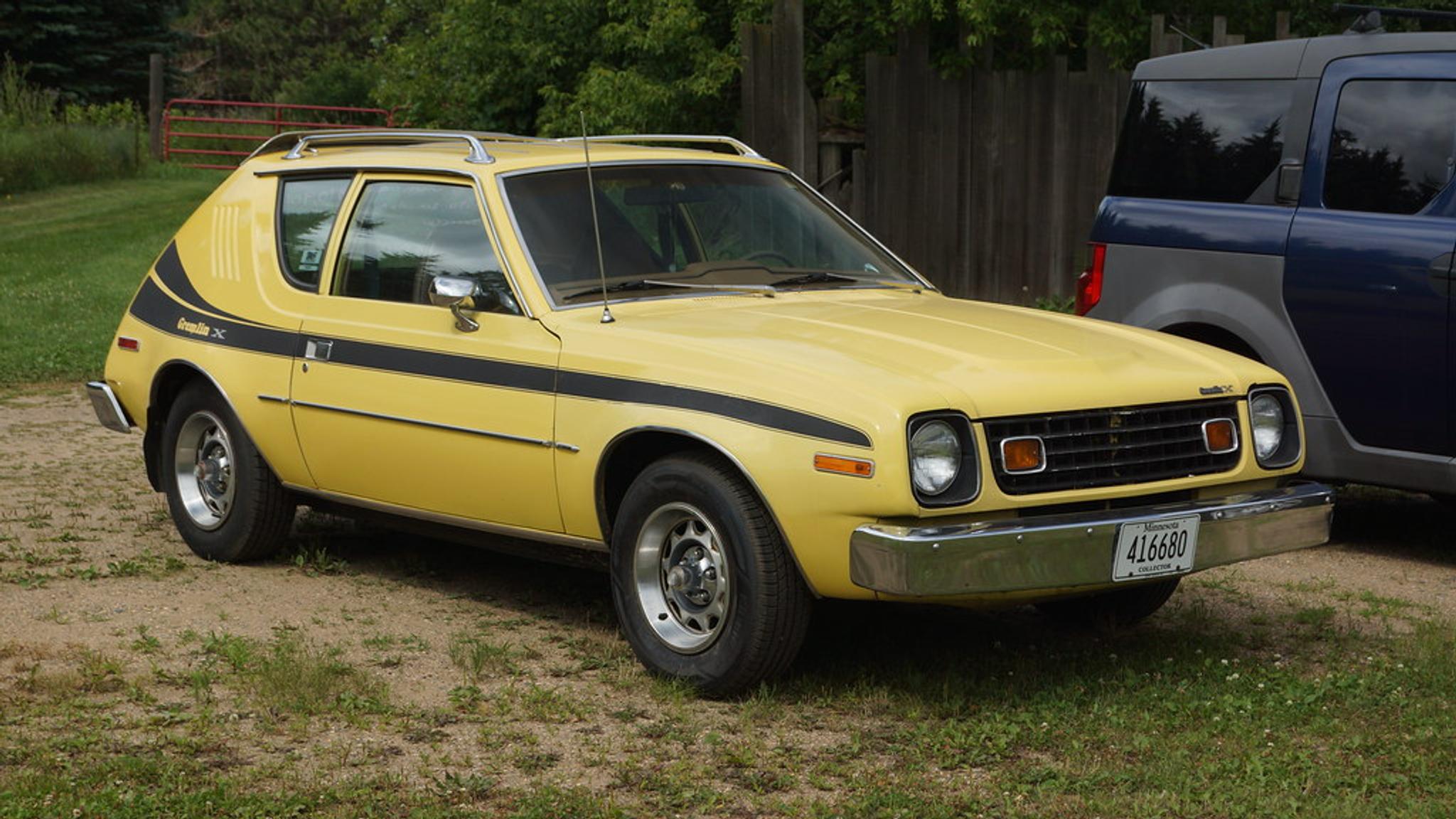 Yellow AMC Gremlin with a black stripe on its side