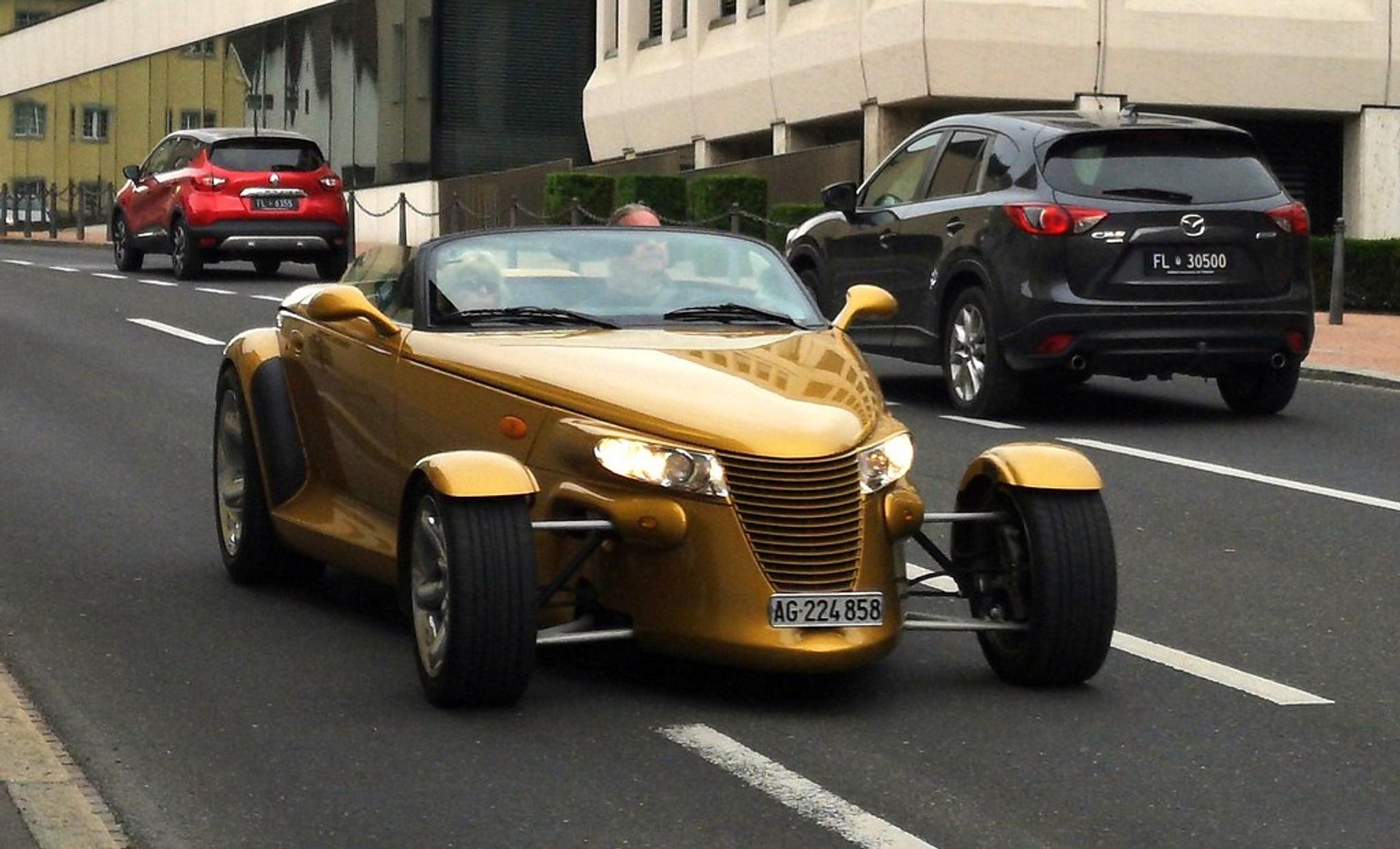Golden Plymouth Prowler on the street