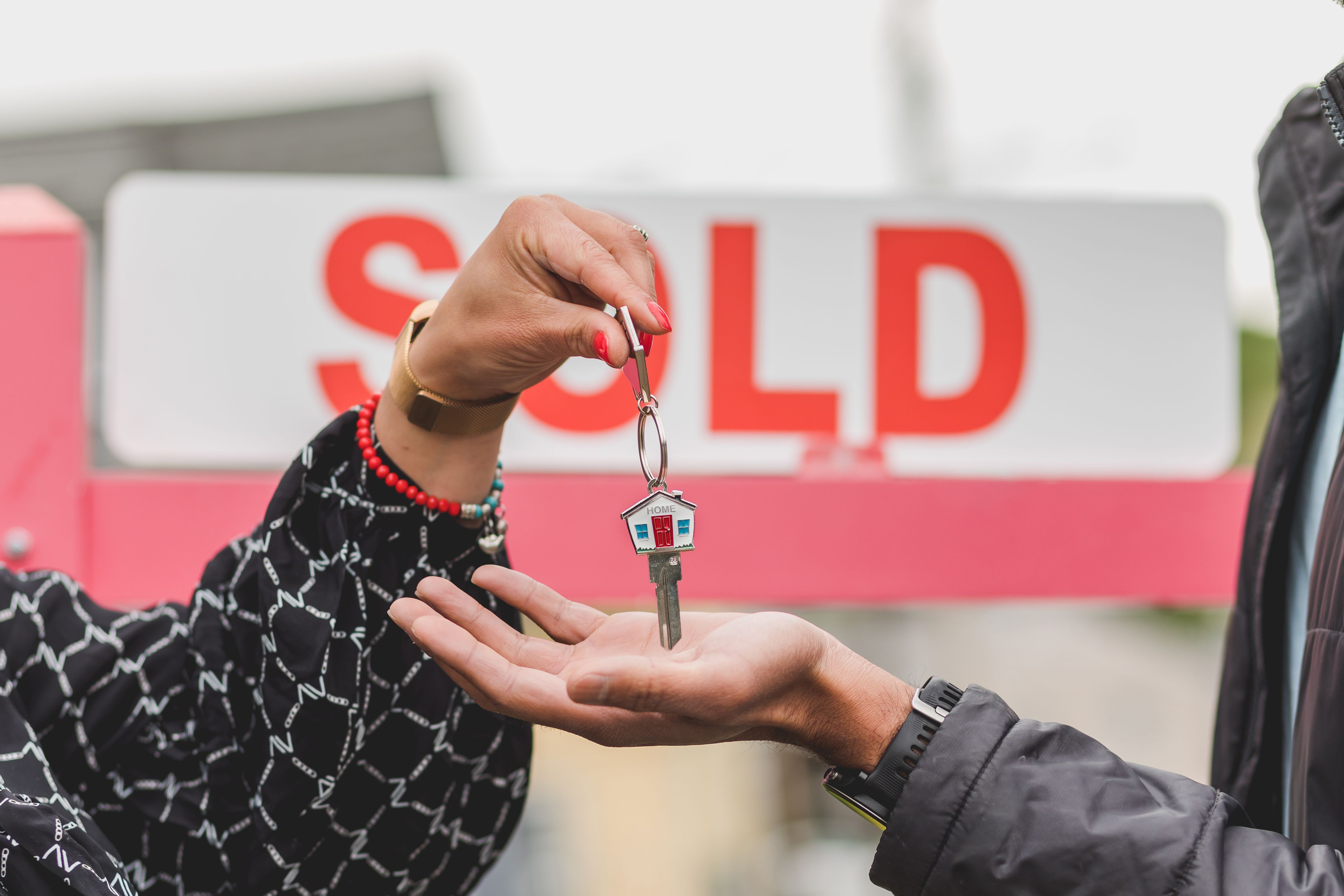 Real estate professional assisting a client