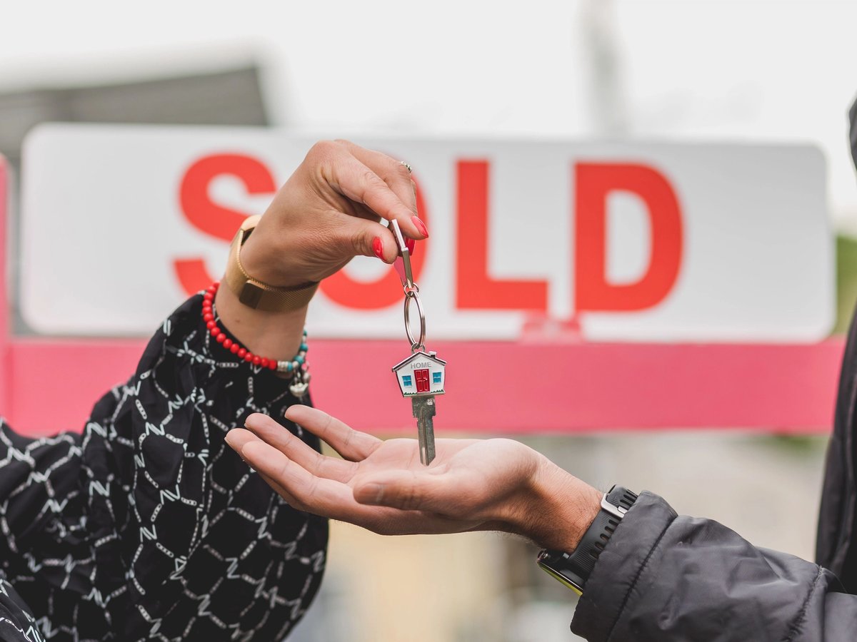 Real estate professional assisting a client