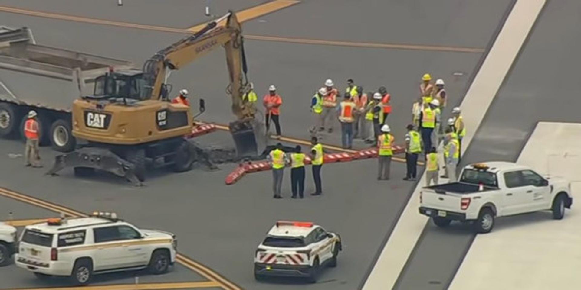 Sinkhole opens near LaGuardia Airport runway, forcing emergency shutdown