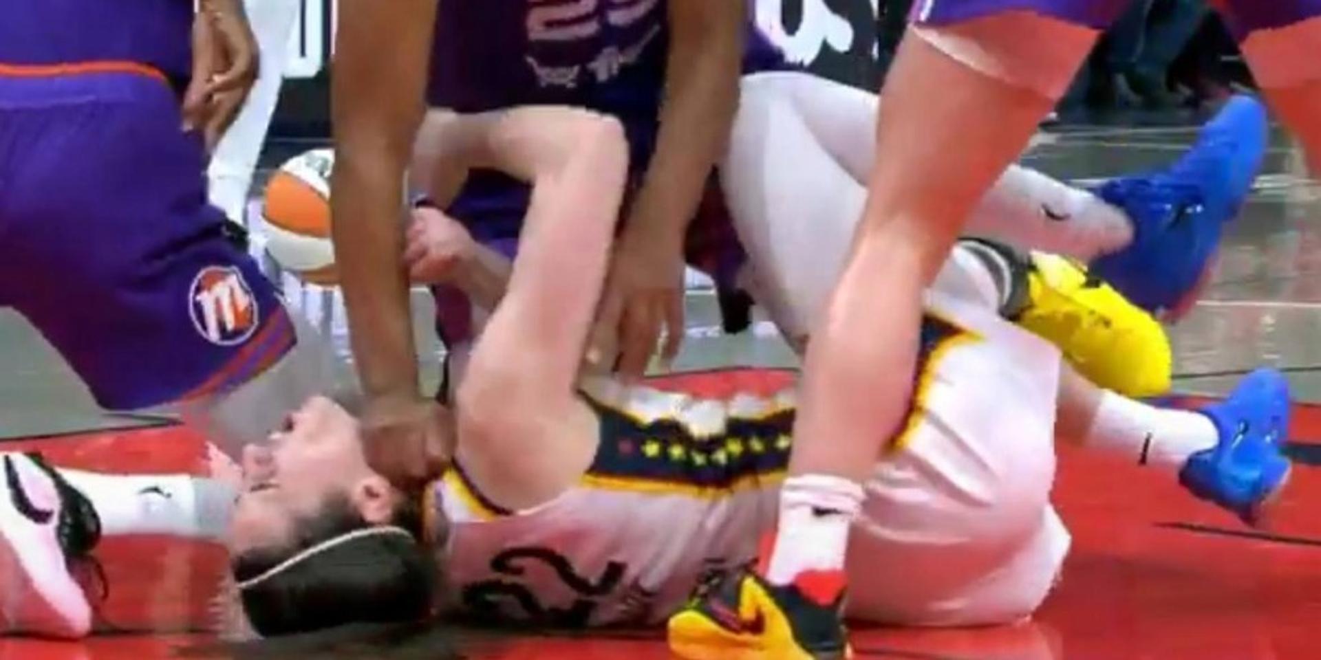 CHEAP SHOT: WNBA star Caitlin Clark takes fist to the neck during game