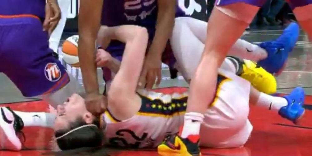 CHEAP SHOT: WNBA star Caitlin Clark takes fist to the neck during game