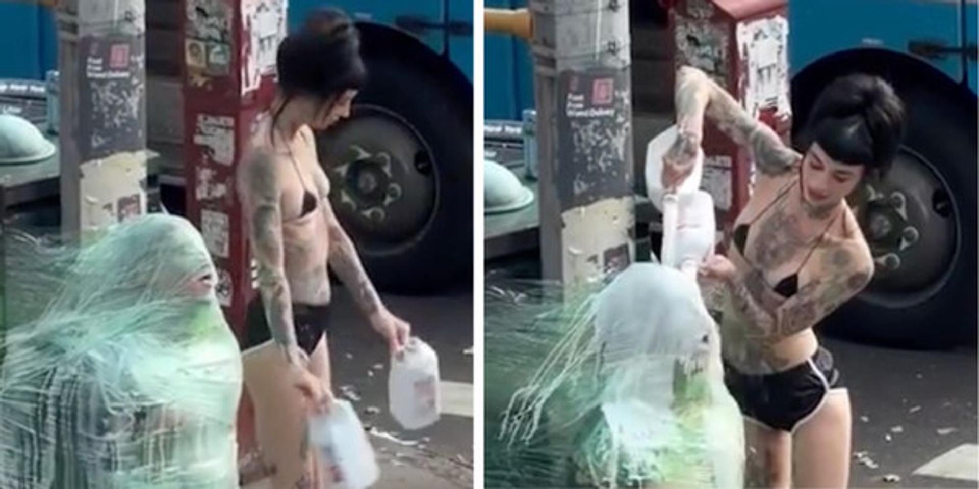 Brooklyn dominatrix wraps client to NYC lamppost, pours milk on him in public BDSM scene