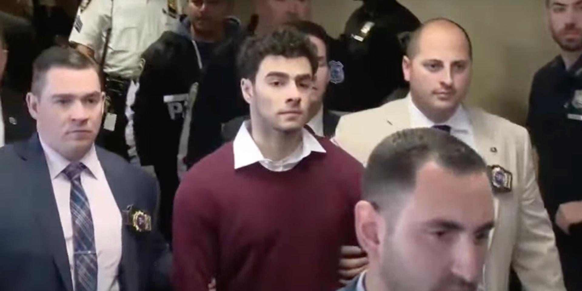 Luigi Mangione yells out in court that he's facing 'double jeopardy' in NY case