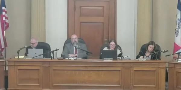 Iowa city council meeting opens with prayer to SATAN