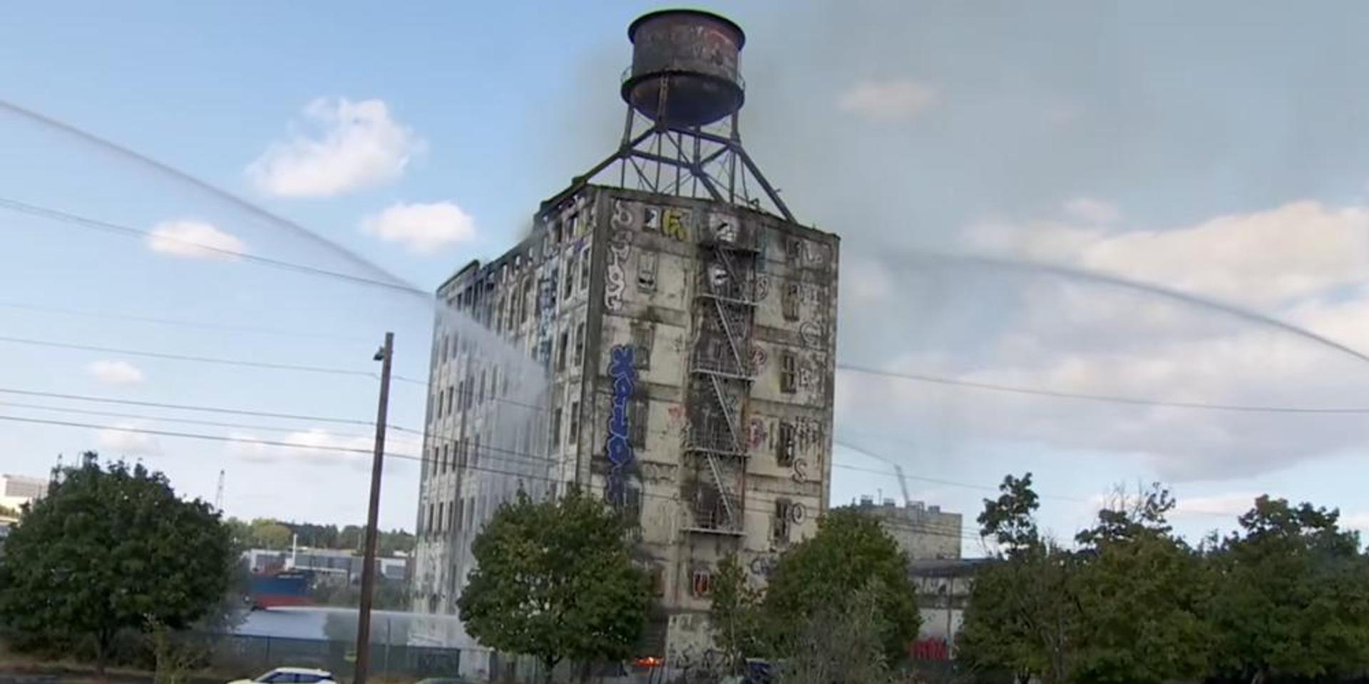 Portland fire crews contain massive warehouse inferno, investigation into cause underway