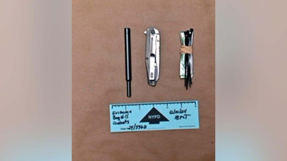 pocket knife and zip ties next to pen for size comparison