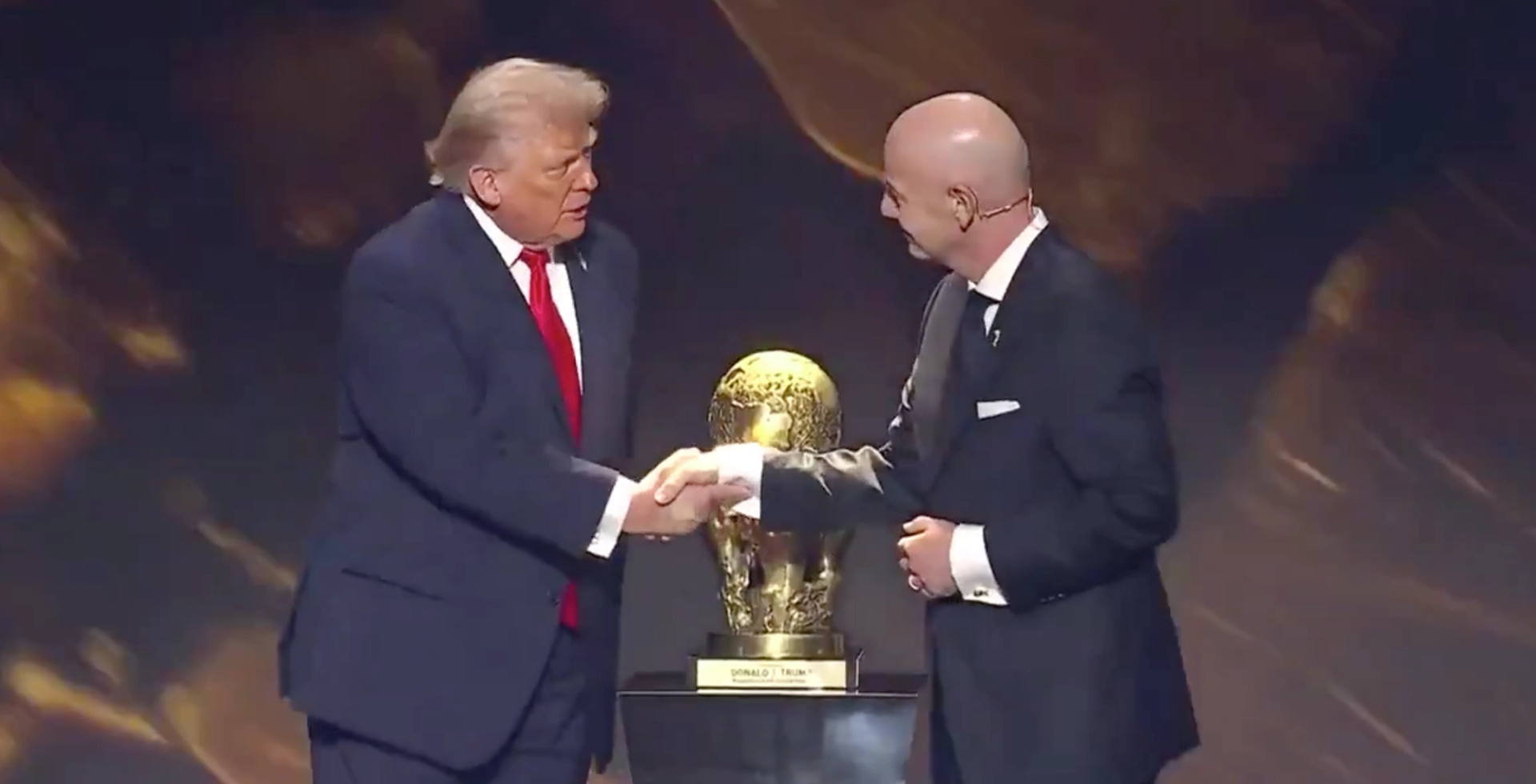 NEW: Trump presented with first-ever FIFA Peace Prize at World Cup draw