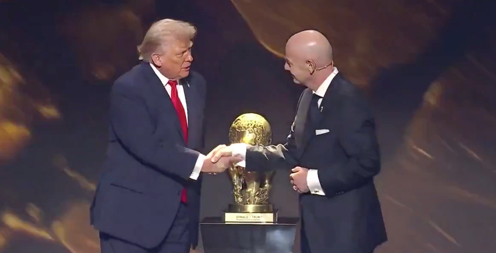 NEW: Trump presented with first-ever FIFA Peace Prize at World Cup draw