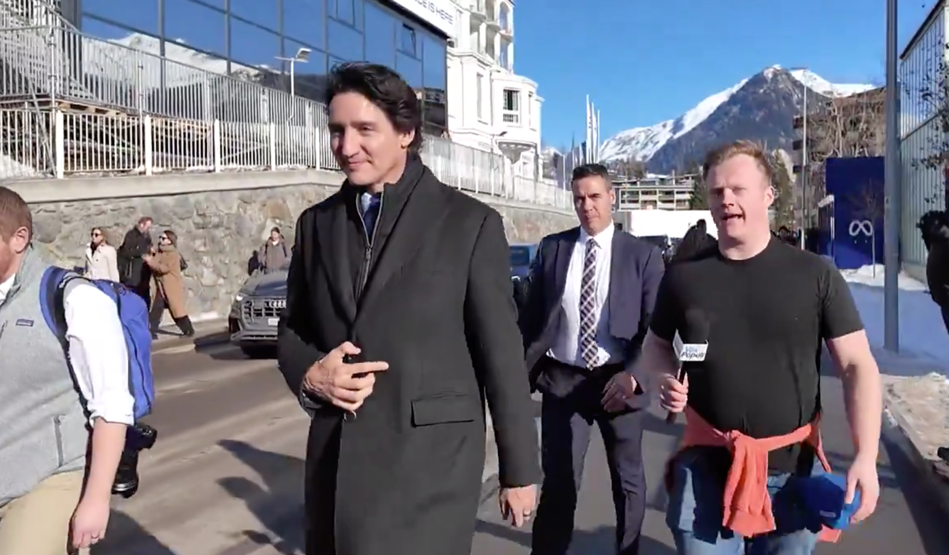 Smug Justin Trudeau laughs off Covid vaccine injuries when confronted at Davos, refuses to apologize for mandates