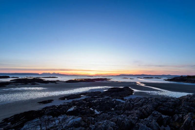 Camusdarach Beach sunset with views to the Small Isles