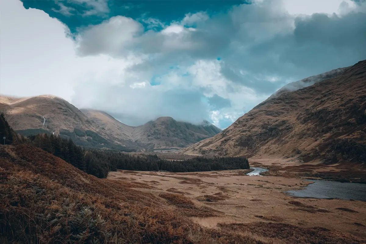 River flowing through Glen Etive — the famous 'James Bond road' with dramatic mountain scenery and river pools
