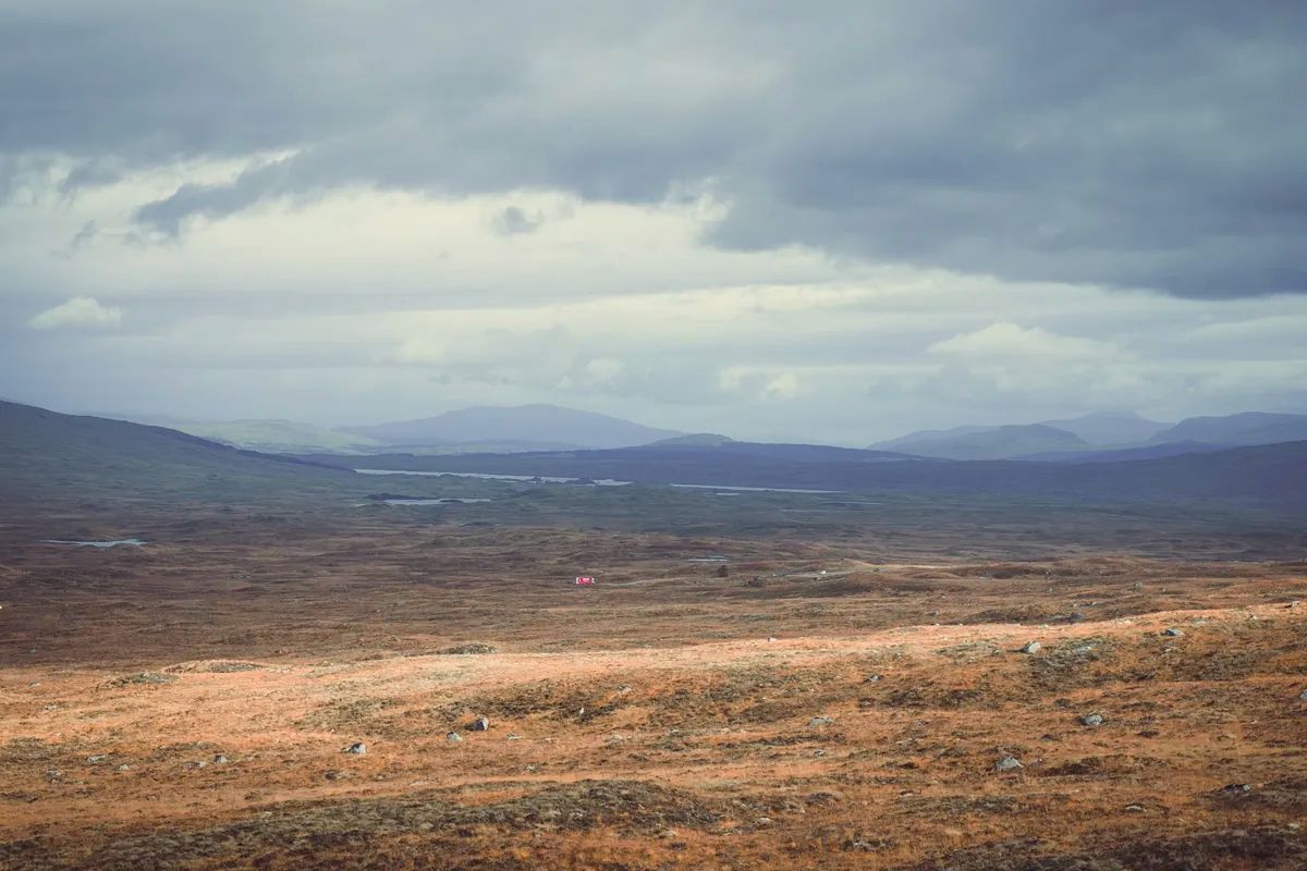 Rannoch Moor — vast Highland moorland with dramatic skies stretching to the horizon, atmospheric landscape photography