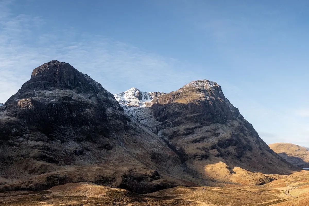 The Three Sisters of Glencoe — dramatic mountain valley viewed from the A82 layby, one of Scotland's most famous landscape views