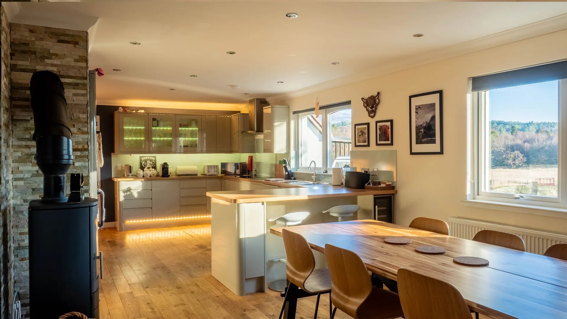 Highwinds Lodge with rainbow over Ben Nevis, Fort William