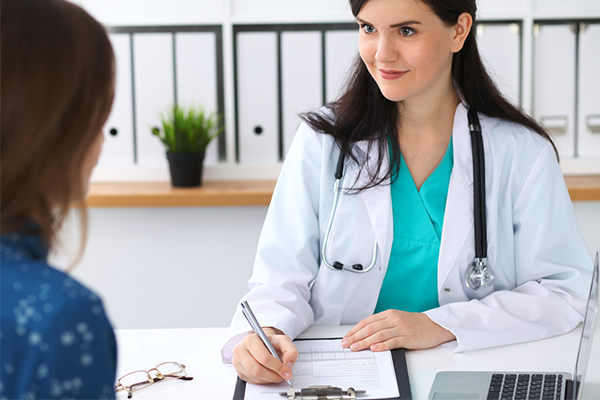 a doctor writing advices