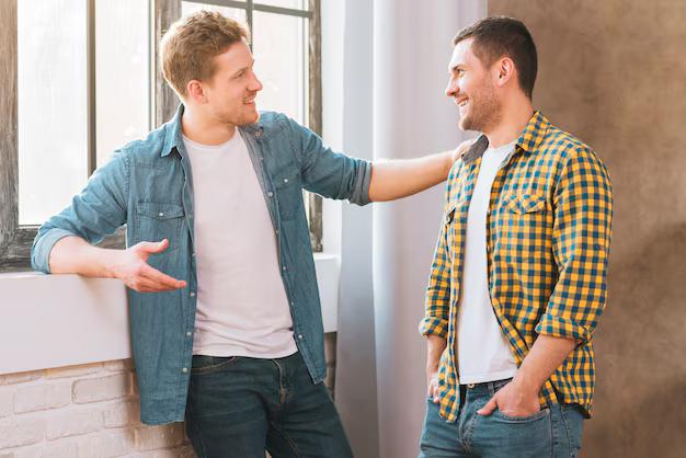 men talking to other