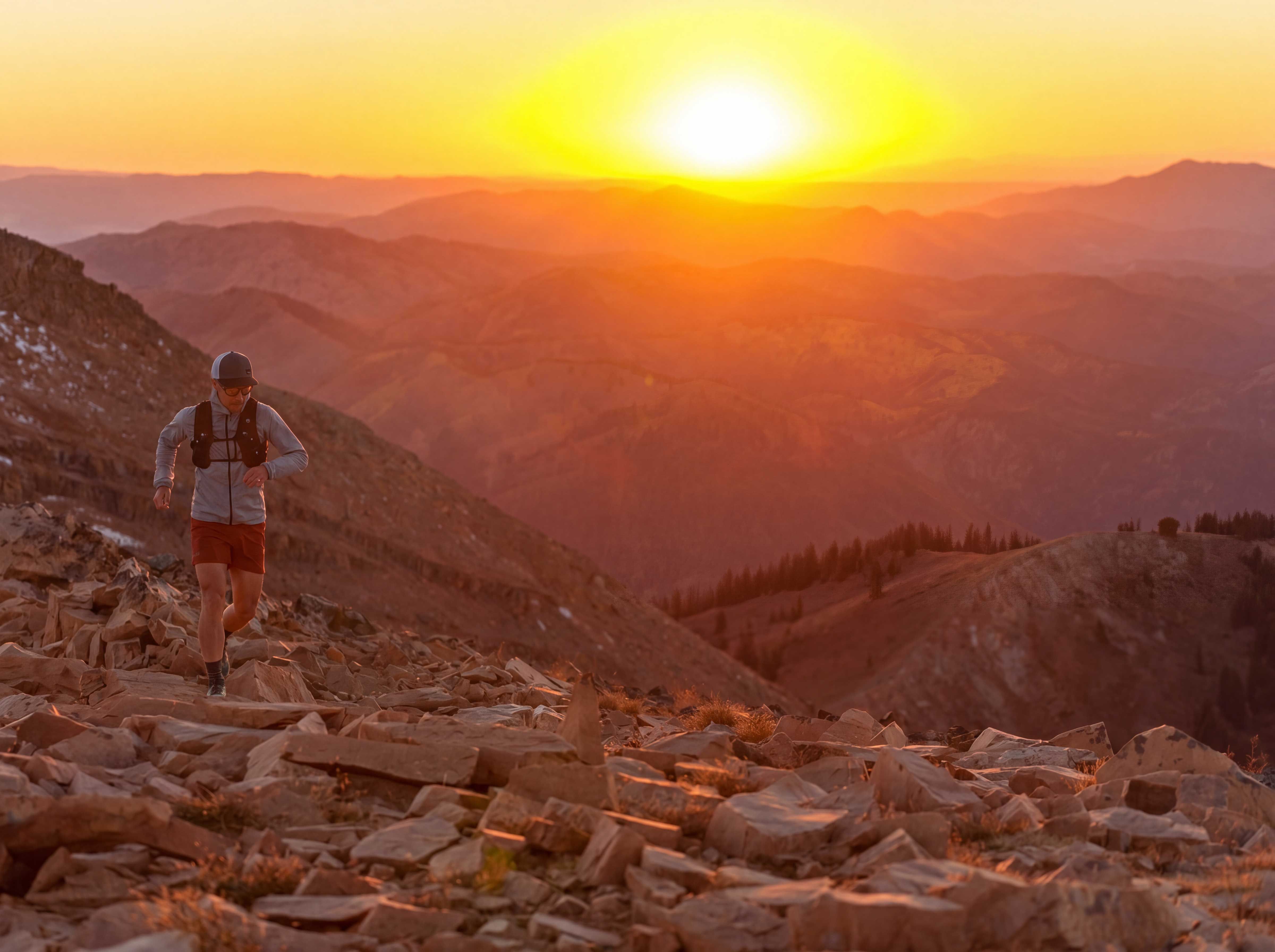 Trail runner on Mt. Taylor, in the Tetons at sunrise