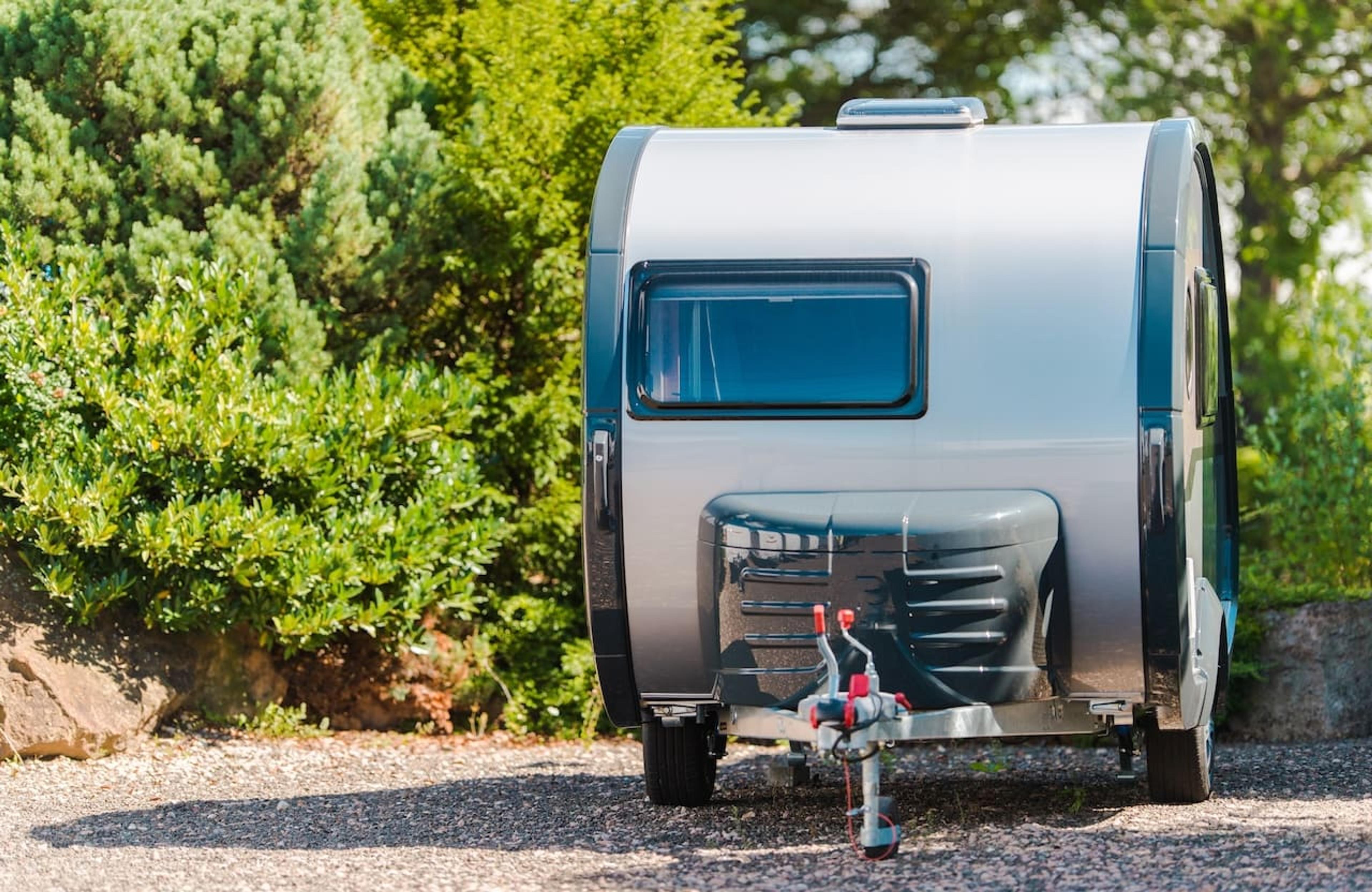 Happy family enjoying their Travel Trailer 