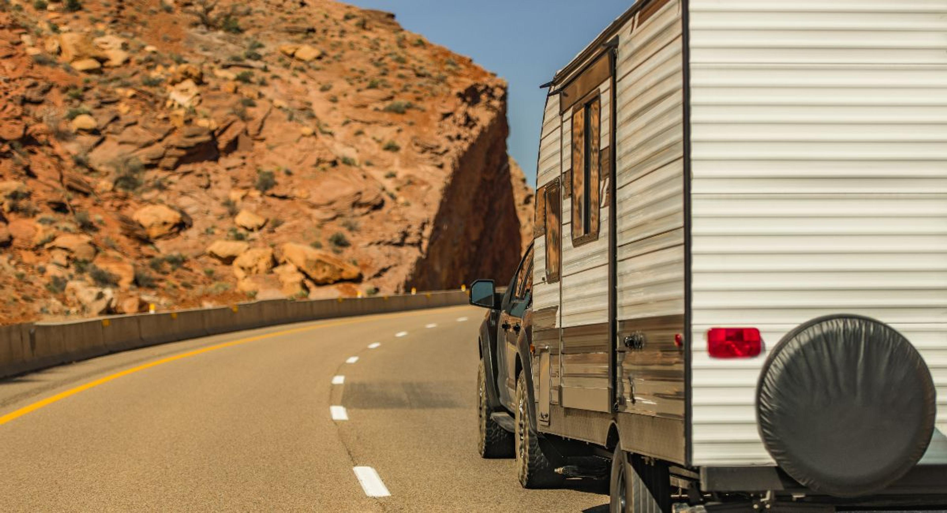 Insured Travel Trailer Recreational Vehicle on a Road Trip.