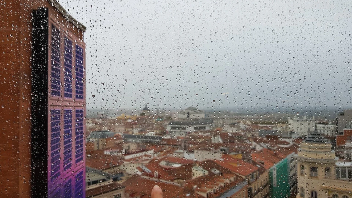 rainy window looking onto city