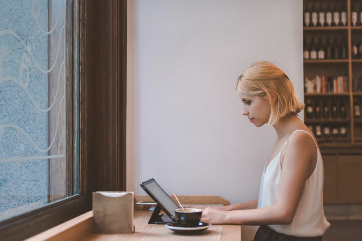 woman working at cafe