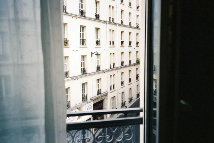 Peaking through window to Paris street