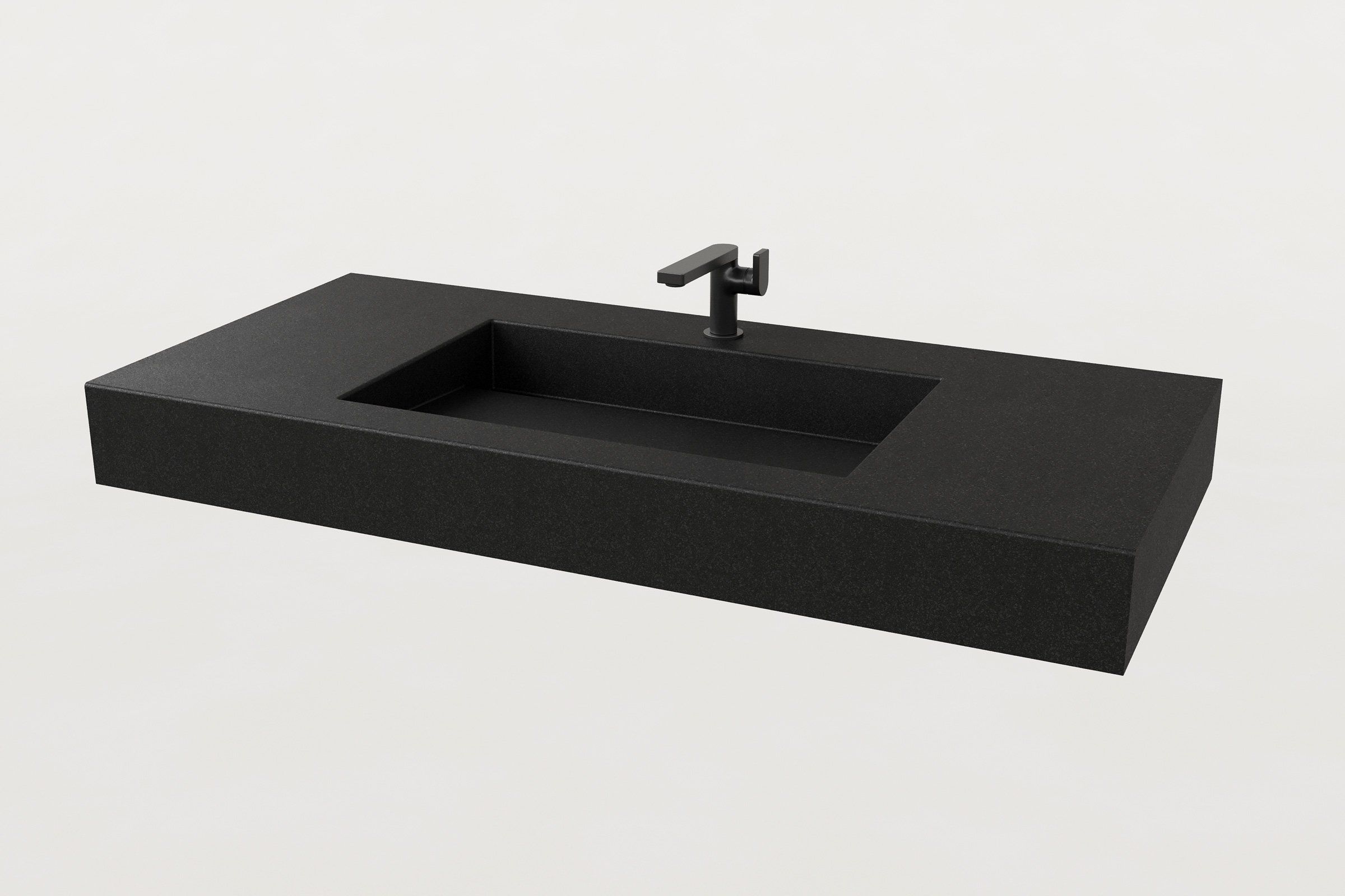 Trof Drop 48 sink in Storm finish with a single-hole matte black faucet installed.