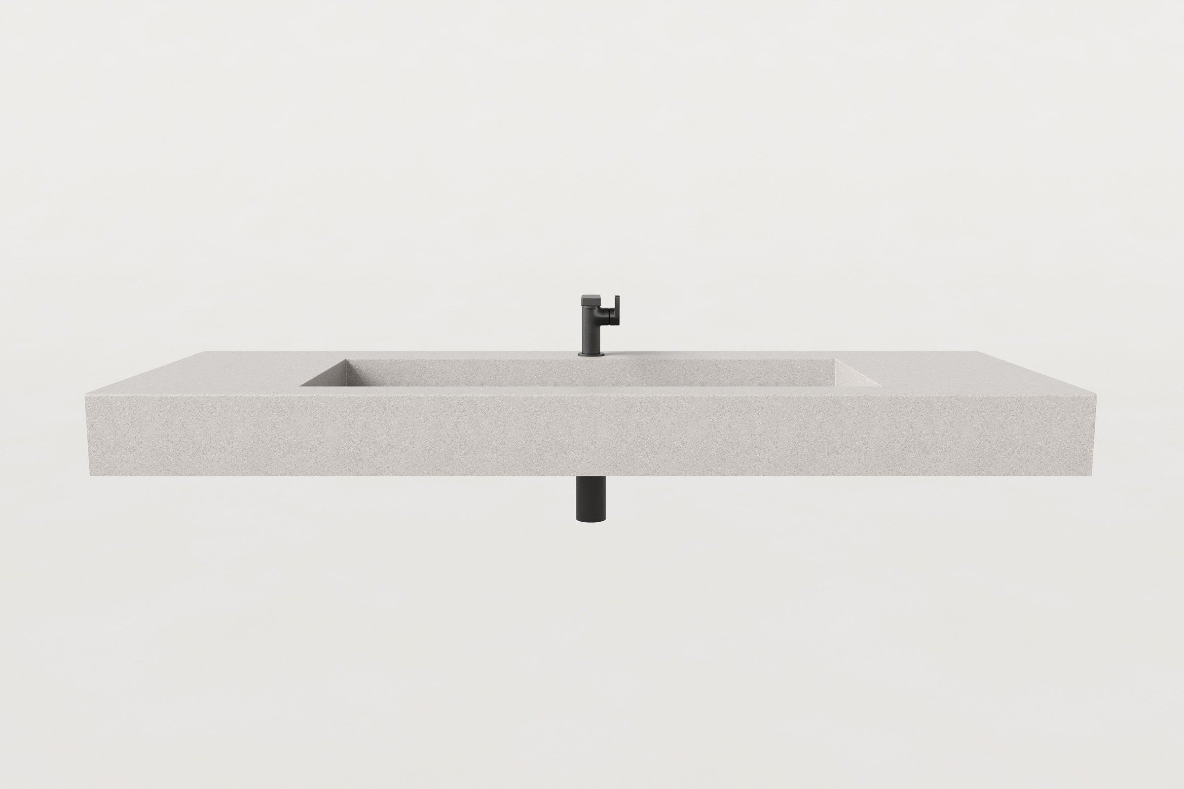 Front view of the Fog concrete sink basin with matte black faucet and visible drain pipe below.