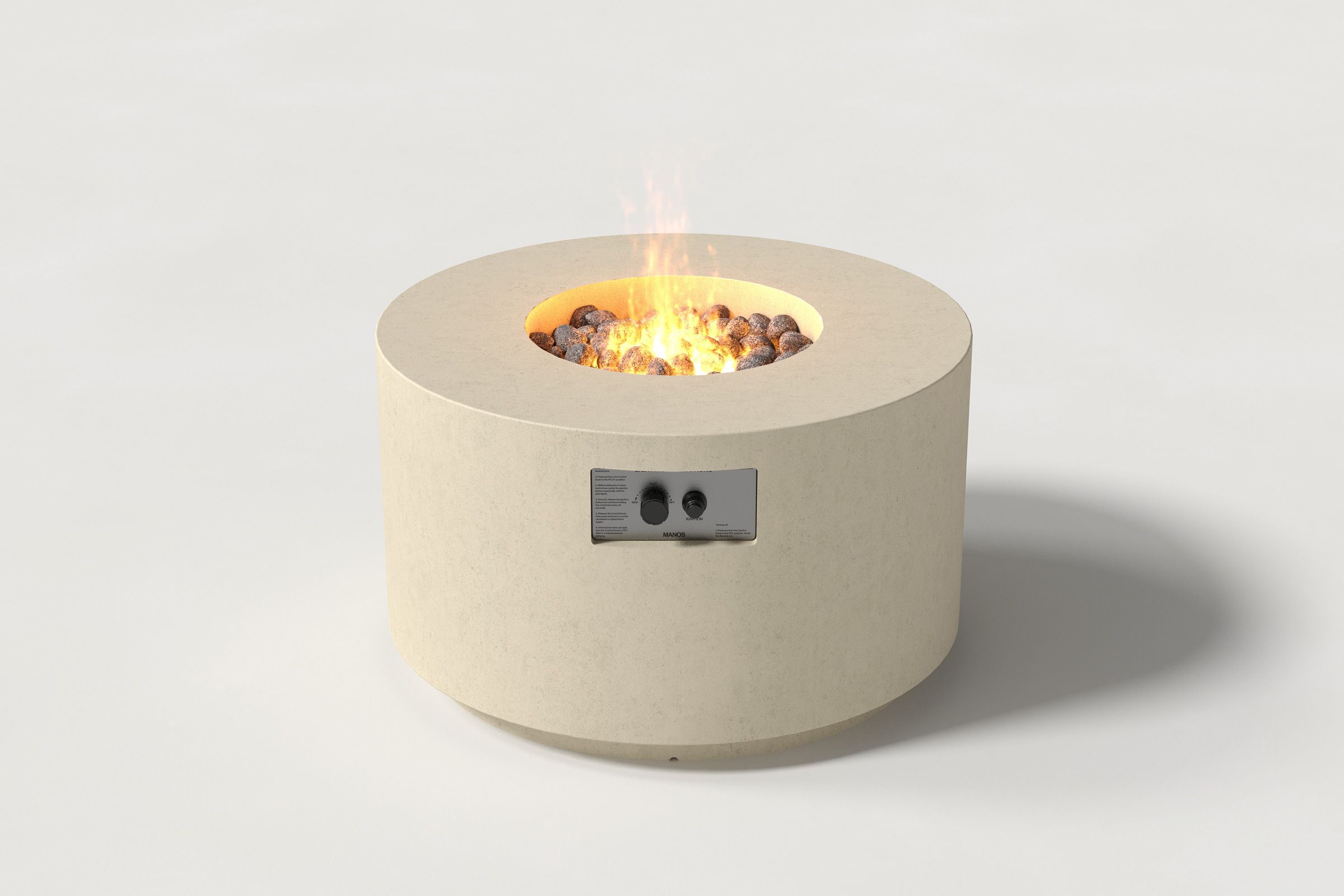 Low cylindrical sand-colored concrete fire pit with thick walls and a central circular well filled with dark volcanic rocks and flame. Side view on a white background.